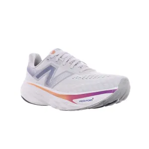 Womens New Balance Fresh Foam X 1080v14 in Grey Matter/Silver Metallic/Inkwell running in a ferry terminal area shoes speed drills