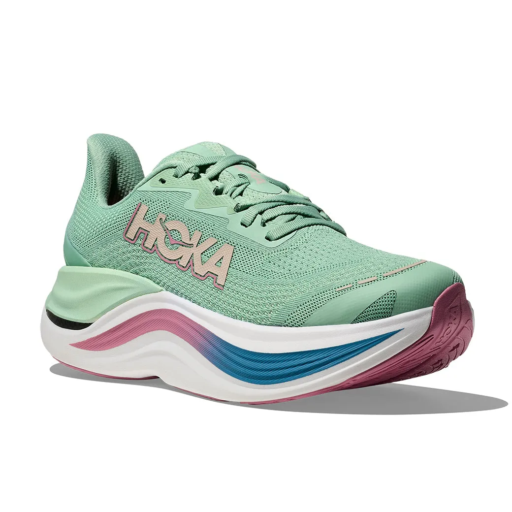 Womens Hoka Skyward X in Jadeite/ Dried Rose Pressure Relief Design running on an indoor track shoes