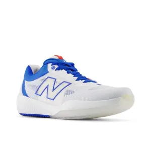 Womens New Balance FuelCell 996 v6 in White/Navy running with a smooth outsole