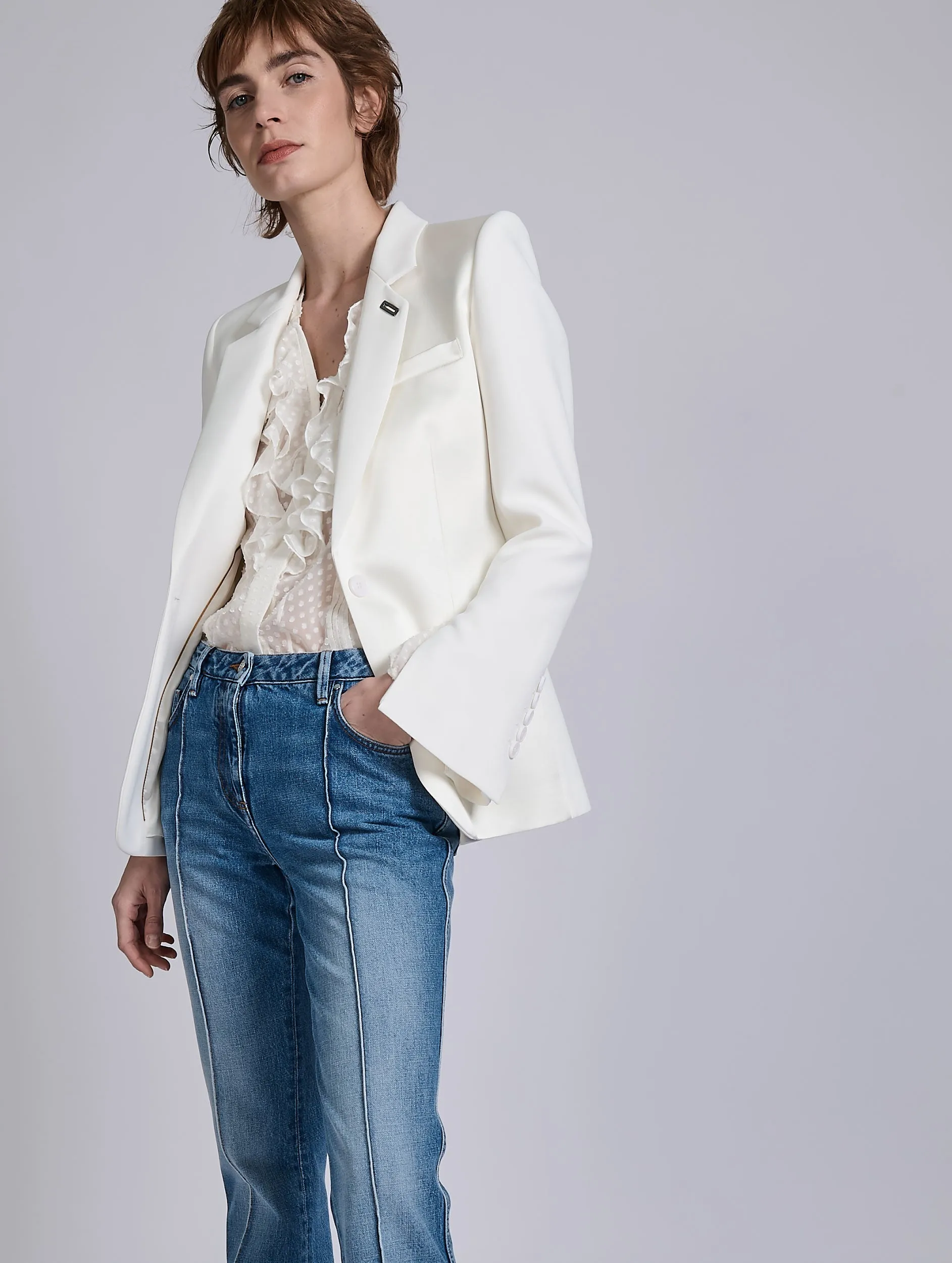 Minimalist fashion White ruffled blouse in jacquard plumetis