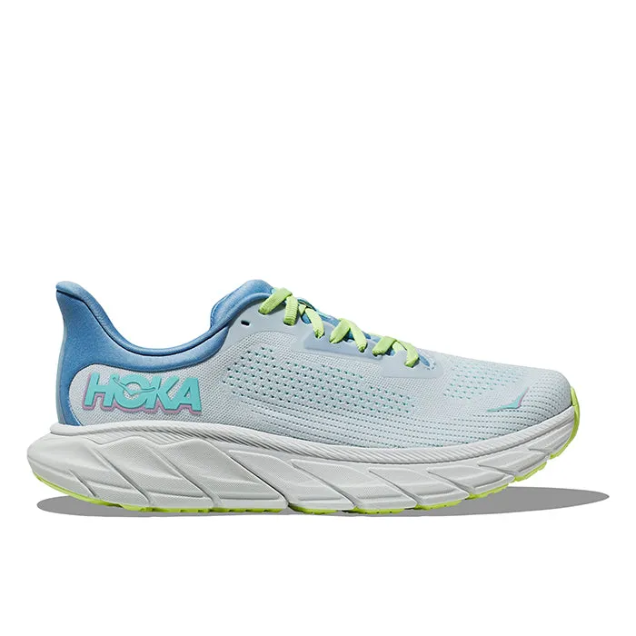 Womens Hoka Arahi 7 in Illusion/Dusk running in a kelp forest area shoes