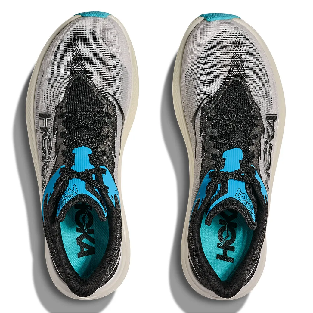 Womens Hoka Rocket X 3 in White/Black running in a desert area