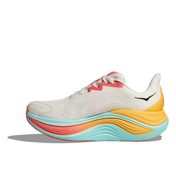 running on a dirt path Womens Hoka Skyward X in Blanc De Blanc/Swim Day